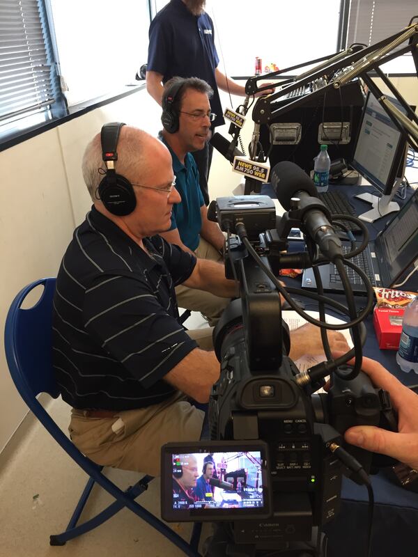 Scott Slade with Clark Howard in the final two hours of the Careathon. CREDIT: Rodney Ho/rho@ajc.com