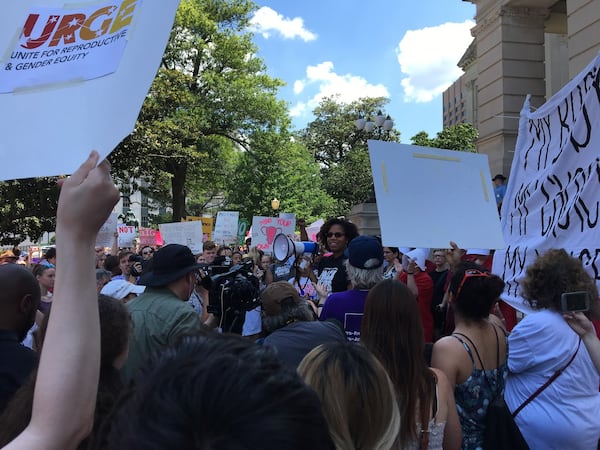 Wanda Mosley, of Black Votes Matter, addresses a crowd of pro-abortion rights demonstrators at the Georiga Capitol.