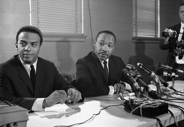 In 1961, Young joined the Atlanta-based Southern Christian Leadership Conference, where he quickly became one of Martin Luther King Jr.'s top lieutenants. Young organized leadership workshops and voter registration drives, becoming the SCLC's executive director in 1964. This photo is from a 1967 press conference. (Bob Dendy / AJC Archive at GSU Library AJCN160-097f)