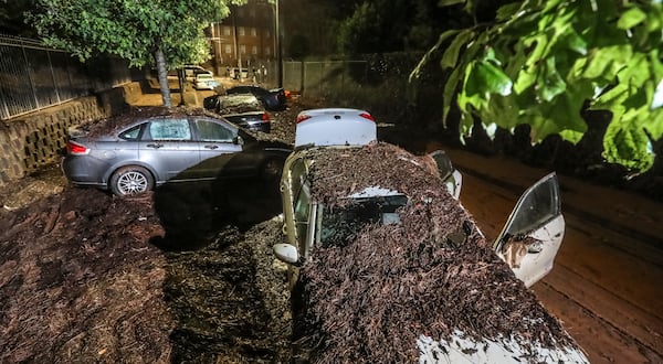 September 15, 2023 Atlanta: Near Clark Atlanta University, flooded cars remained after the water receded. (John Spink / John.Spink@ajc.com)

