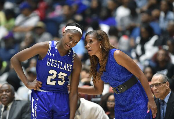 Westlake head coach Hilda Hankerson instructs Westlake Raven Johnson (25) in GHSA State Basketball Championship game at the Macon Centreplex in Macon on Saturday, March 9, 2019. HYOSUB SHIN / HSHIN@AJC.COM