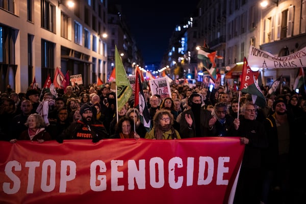 Protestors take part in a rally against the "Israel is Forever" gala organized by far-right Franco-Israeli figures, in Paris, Wednesday, Nov. 13, 2024, on the eve of the UEFA Nations League 2025 soccer match between France and Israel. (AP Photo/Louise Delmotte)