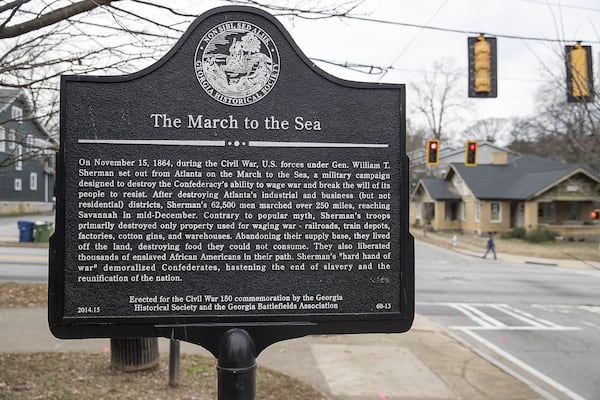 A historical marker commemorating Union Gen. William T. Sherman’s destructive march from Atlanta to Savannah is displayed at the intersection of North Avenue and Moreland Avenue in Atlanta. ALYSSA POINTER / ALYSSA.POINTER@AJC.COM