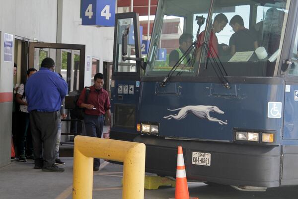 An asylum seeker from Guatemala boards a Greyhound bus in El Paso, Texas.