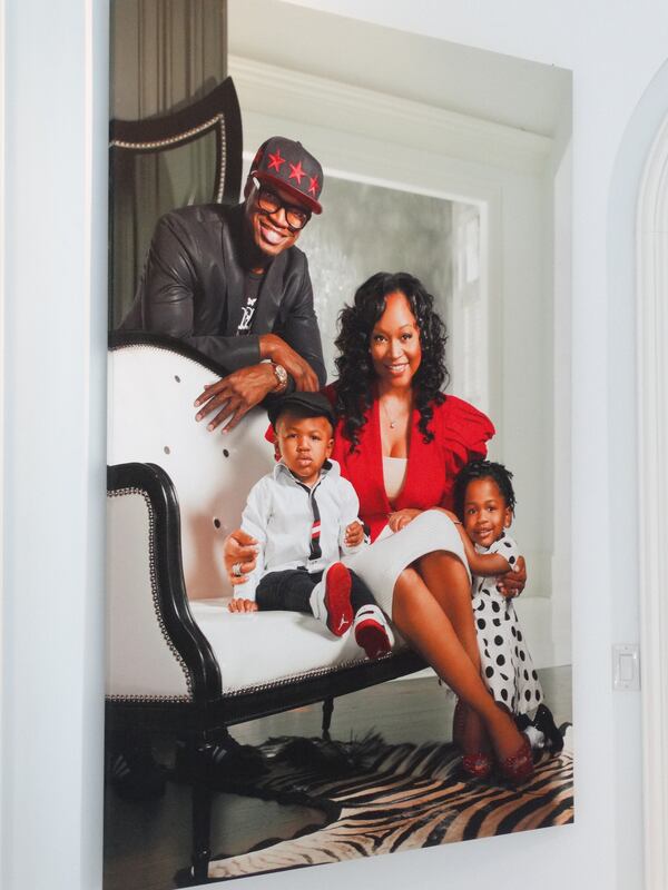 Menyatta Shaw, as of June, held a press junket at her home with Ne-Yo which features this monstrous portrait of the family. You'll see this portrait in the first episode as well. CREDIT: Rodney Ho/rho@ajc.com