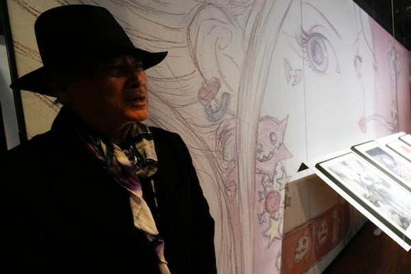 Artist Yoshitaka Amano attends the press preview of the exhibition "Amano Corpus Animae", celebrating his 50-year-long career, at the Fabbrica del Vapore, in Milan, Italy, Tuesday, Nov. 12, 2024. (AP Photo/Luca Bruno)