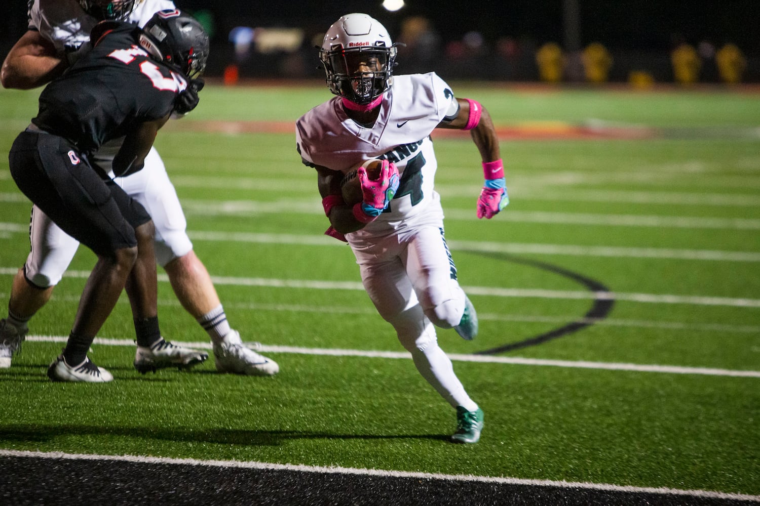 Noah Voltaire, freshman quarterback for Kennesaw Mountain, runs the ball into the end zone on Friday, October 7, 2022 in Marietta. Kennesaw Mountain defeated Osborne 49-0. CHRISTINA MATACOTTA FOR THE ATLANTA JOURNAL-CONSTITUTION