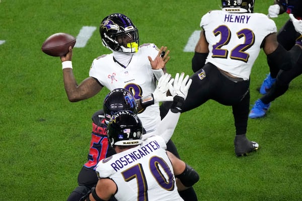 Baltimore Ravens quarterback Lamar Jackson throws a pass during the first half of an NFL football game against the Houston Texans, Wednesday, Dec. 25, 2024, in Houston. (AP Photo/Eric Christian Smith)