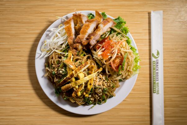  Snackboxe Bistro Weekly Special, Kua Mee, pan fried rice noodle with bean sprouts, egg omelette, crushed peanuts, and side of papaya salad. Photo credit- Mia Yakel.