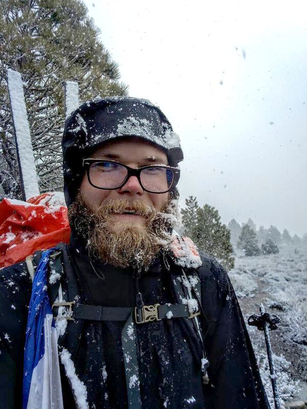 In this May 15, 2017, selfie shows hiker Brien Bower in a snow storm along Pacific Crest Trail in California's southern Sierra Nevada. Bower, who hiked the 2,600-mile trail in 2015, detoured from the trail this spring after being caught in an avalanche and encountering dangerous river crossings and ended his effort to complete the hike after getting sick. (Brien Bower via AP)