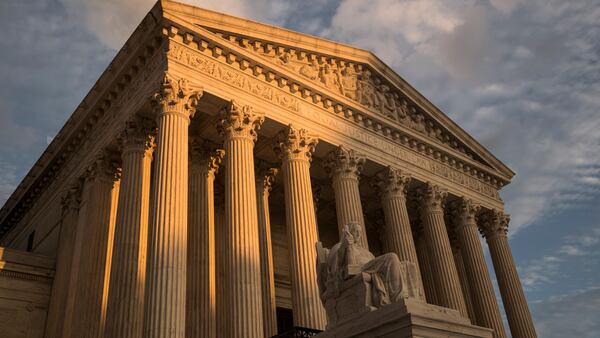 FILE - In this Oct. 10, 2017, file photo, the Supreme Court in Washington, at sunset.  The U.S. Supreme Court on Monday declined to hear an appeal by the Trump administration of a federal judge’s ruling that blocked, at least temporarily, the president from ending the Deferred Action for Childhood Arrivals (DACA) program.