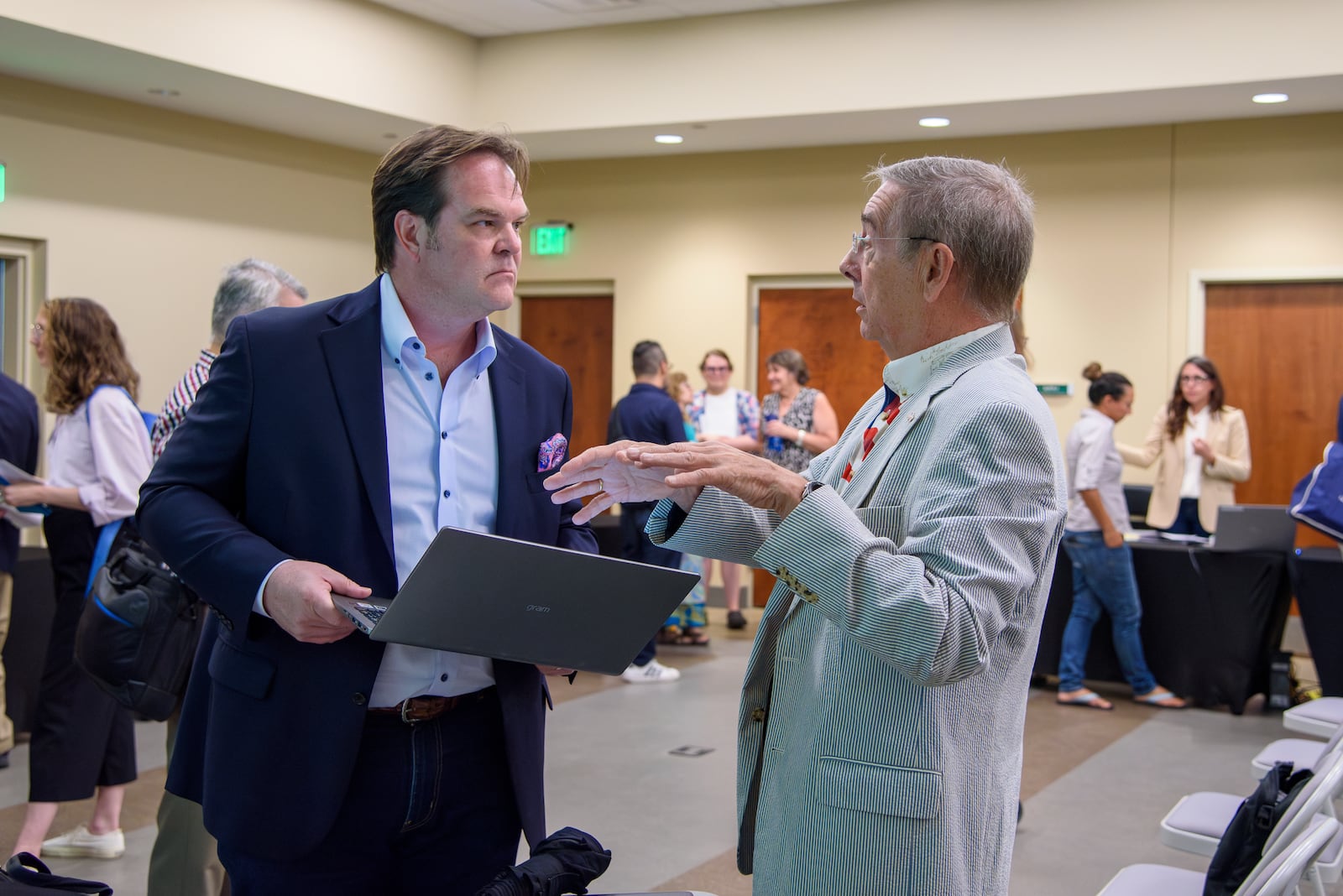 Steven Bartelski speaks with attendees about the challenges concerning the eligibility of 800 voters at the Forsyth County Voter Registrar in Cumming, Ga., June 28, 2024. (Jamie Spaar/Atlanta Journal-Constitution via AP)