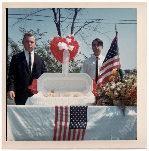 Found photos from Kevin Duffy's "Picture Taker." “America is in love with its pet dogs. And when one passes it’s a big deal, as evidenced by the numerous pet cemeteries with elaborate headstones. But rarely is there a funeral befitting a hero with flags, flowers and youngsters dressed in their Sunday finest.”