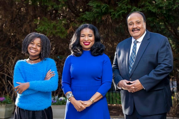 Martin Luther King III (right), Arndrea Waters King and their daughter Yolanda Renee King (left) stand for a portrait at their residence in Atlanta, Georgia, Thursday, January 28, 2021. (Alyssa Pointer / Alyssa.Pointer@ajc.com)