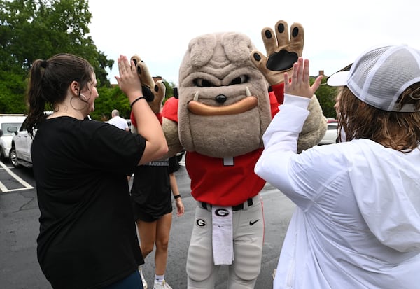 University of Georgia mascot Hairy Dawg greets students in Athens.