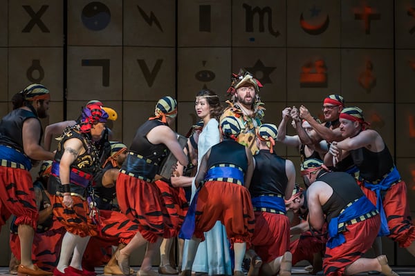 Barry Banks as Monostatos, far left, and his minions capture Mei Gui Zhang as Pamina, center left, and Luke Sutliff as Papageno, center right.