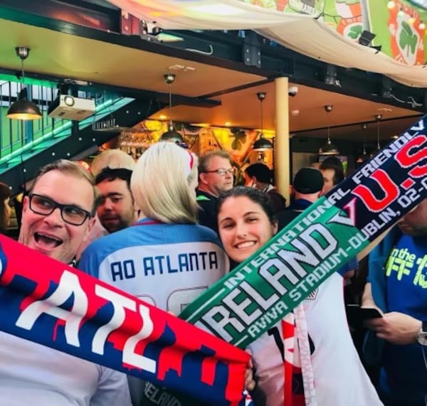 Bert Smith and Kelly Carter were part of a group from the Atlanta chapter of the American Outlaws that travelled to Dublin, Ireland  to watch the U.S. women play in April 8, 2023.