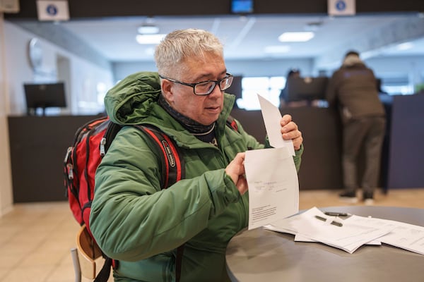 Carl Fleischer, 59, votes during early voting for Greenlandic parliamentary elections at the city hall in Nuuk, Monday, Greenland, March 10, 2025. (AP Photo/Evgeniy Maloletka)