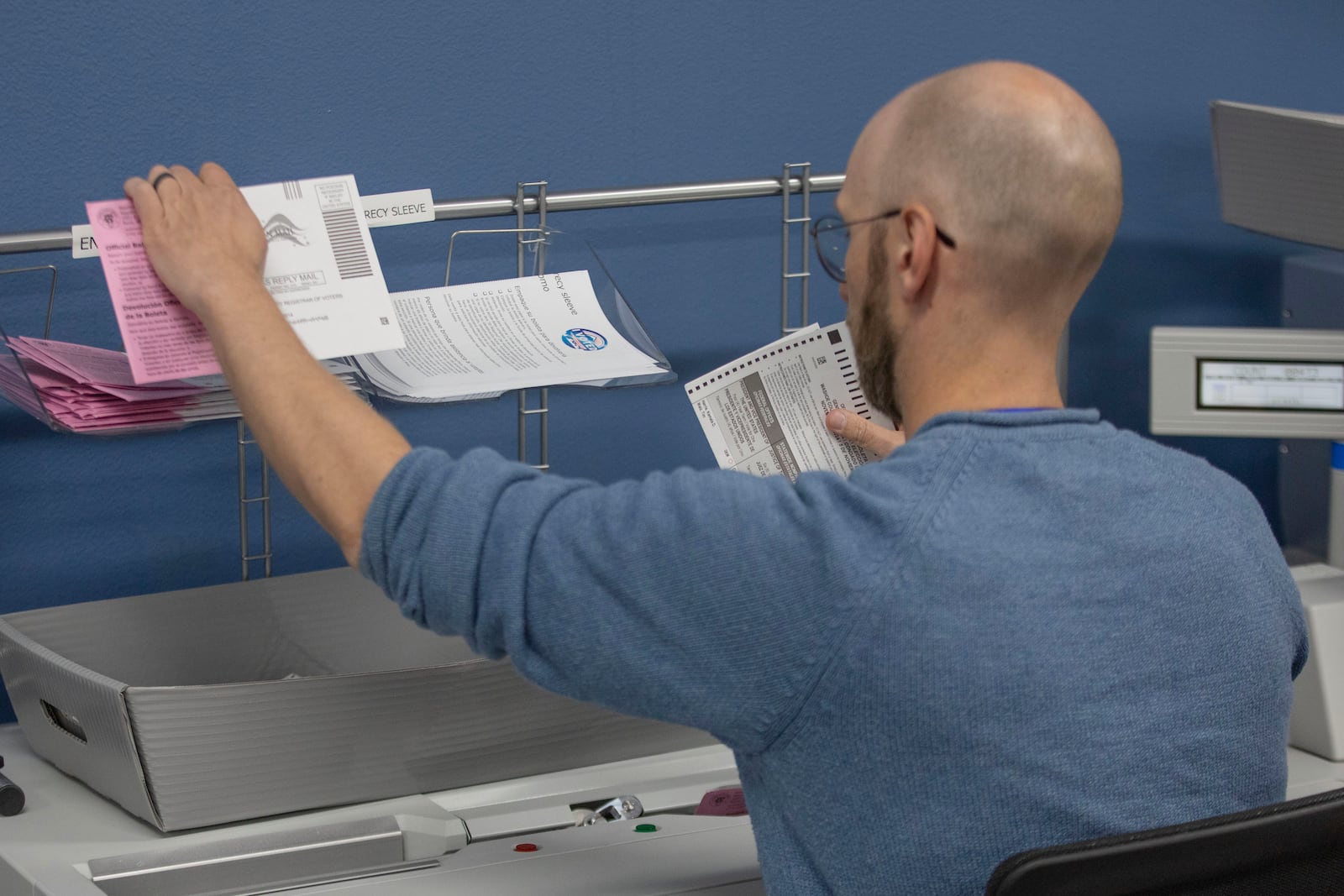 Washoe County election workers sort ballots at the Registrar of Voters Office in Reno, Nev., on Tuesday, Oct. 29, 2024. (AP Photo/Tom R. Smedes)