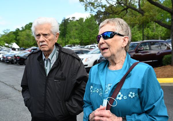 Susan and Sheldon Hammond talk about pastor Charles Stanley outside First Baptist Atlanta where he led for more than 50 years, Saturday, April 22, 2023, in Atlanta.  (Hyosub Shin / Hyosub.Shin@ajc.com)