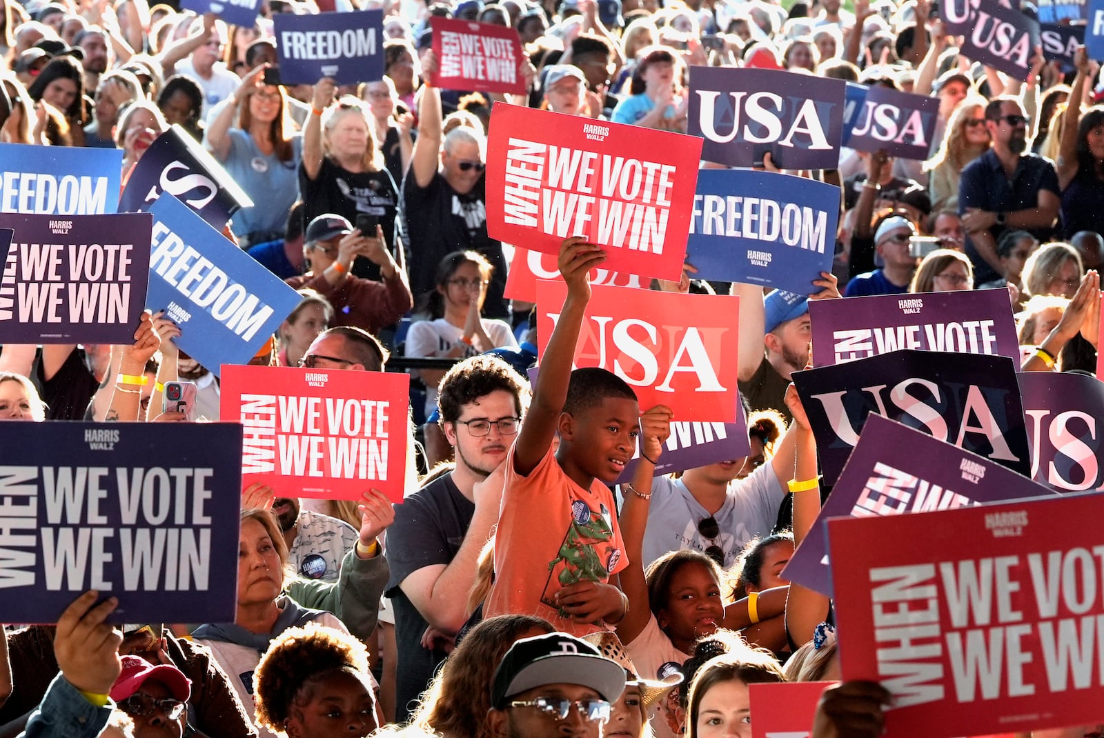 Supporters rally behind Vice President Kamala Harris at a campaign event in Charlotte, N.C.