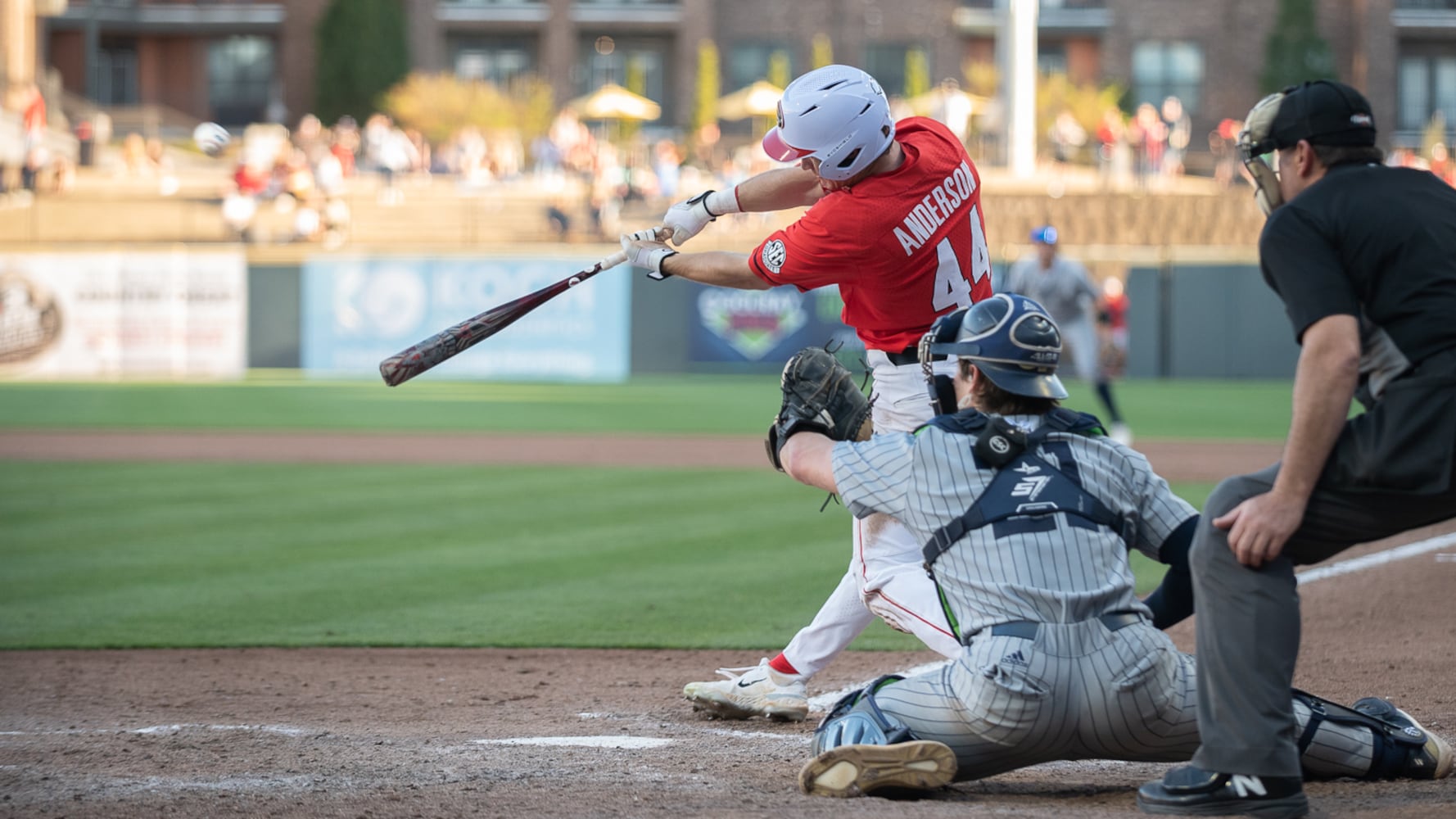 The Bulldogs' Ben Anderson hits the ball during the 20th Spring Classic against Georgia Tech on Sunday at Coolray Field in Lawrenceville. (Jamie Spaar / for The Atlanta Journal-Constitution)