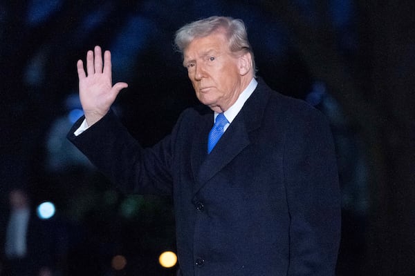 President Donald Trump waves to the media as he walks on South Lawn of the White House, in Washington, Sunday, March 9, 2025. (AP Photo/Jose Luis Magana)