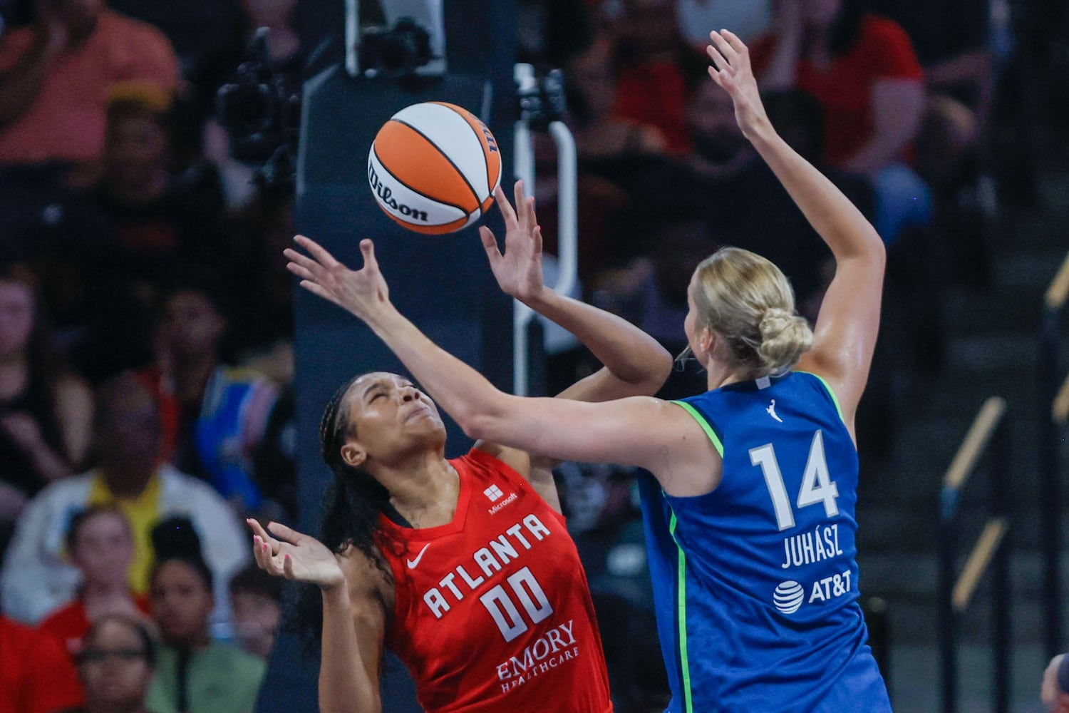 Atlanta Dream forward Naz Hillmon (left) battles for the ball against Minnesota Lynx forward Dorka Juhasz during the second half at Gateway Center Arena, Sunday, May 26, 2024, in Atlanta. (Miguel Martinez / AJC)