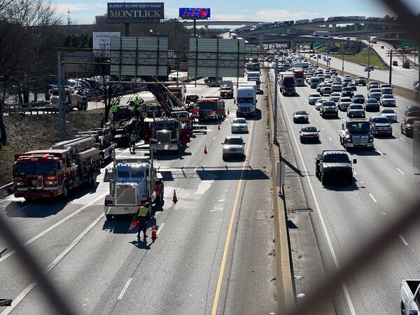 One lane reopens after a car carrier caught on fire in DeKalb County on Monday.