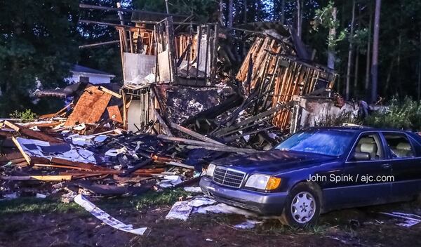 Only wood framing remains after a home on Hasty Lane in the Austell area burned and exploded last month.