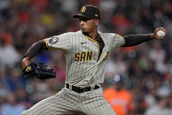 San Diego Padres relief pitcher Ray Kerr delivers during the eighth inning of a baseball game against the Houston Astros, Friday, Sept. 8, 2023, in Houston. (AP Photo/Kevin M. Cox)