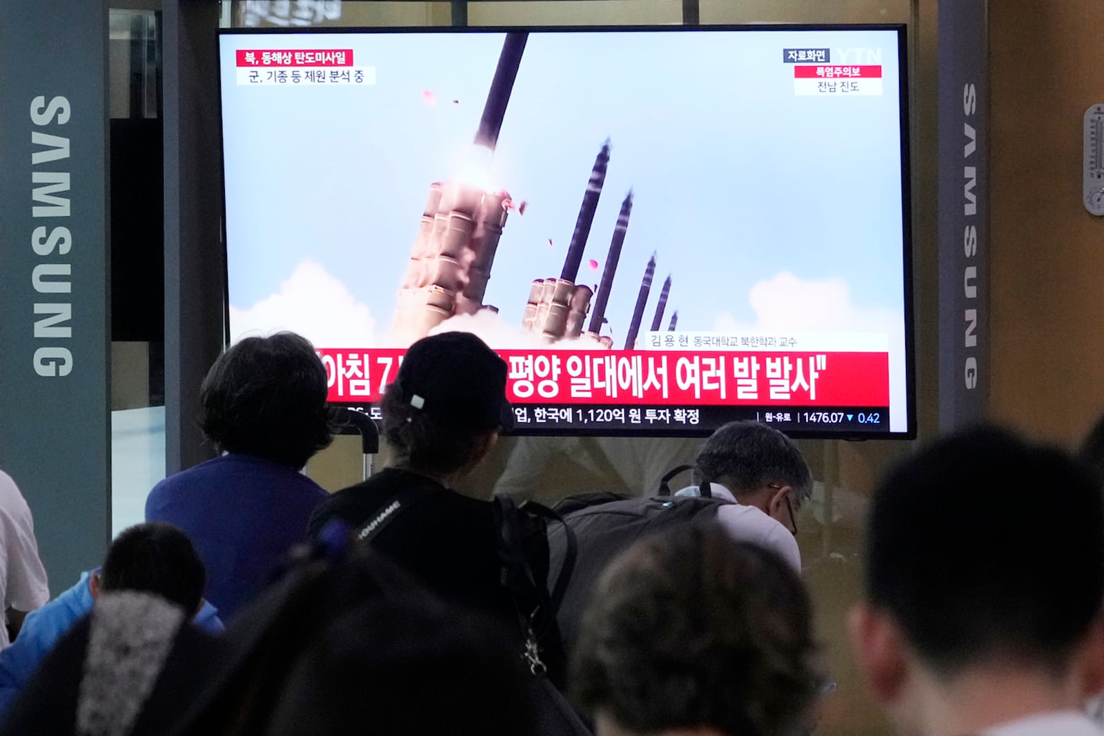 A TV screen shows a file image of North Korea's missiles launch during a news program at Seoul Railway Station in Seoul, South Korea, Thursday, Sept. 12, 2024. (AP Photo/Ahn Young-joon)