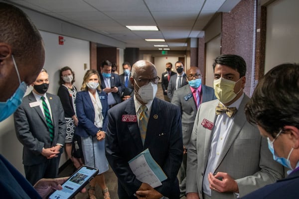 06/19/2020 - Atlanta, Georgia -  Georgia Rep. Calvin Smyre (D-Columbus), center, and Rep. Chuck Efstration (R-Dacula) hold a presser following a Senate Judiciary committee meeting on day 34 of the legislative session at the Paul D. Coverdell building in Atlanta, Friday, June 19, 2020. Sen. Bill Cowsert (R-Athens) added an amendment to HB 426 that would add first responders to be a protected class in Georgia proposed hate crime law. The amendment passed the committee with no support from Democrats and will now be presented to the House.(ALYSSA POINTER / ALYSSA.POINTER@AJC.COM)