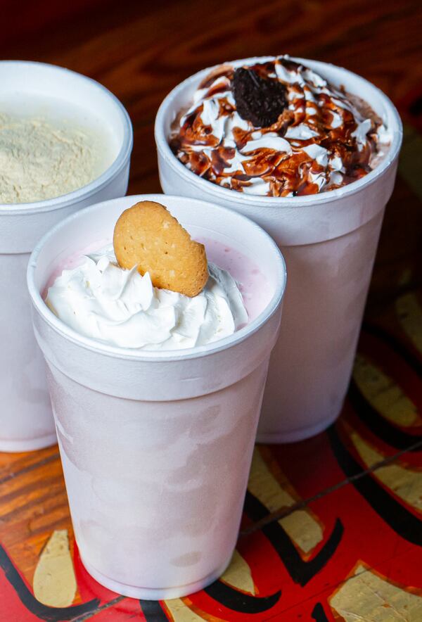 Vanilla, Strawberry and chocolate milkshakes are served up at Atlanta institution, Woody's Cheesesteaks. (Ryan Fleisher for The Atlanta Journal-Constitution) 