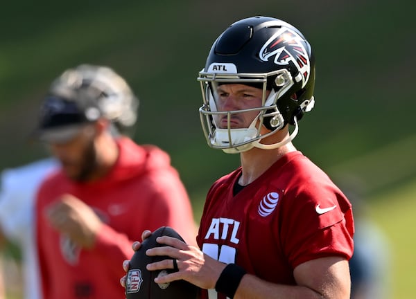 Atlanta Falcons quarterback Logan Woodside (11) prepares to throw during the first day of 2023 AT&T Atlanta Falcons Training Camp at Atlanta Falcons Corporate Headquarters and Training Facility, Wednesday, July 26, 2023, in Flowery Branch. (Hyosub Shin / Hyosub.Shin@ajc.com)