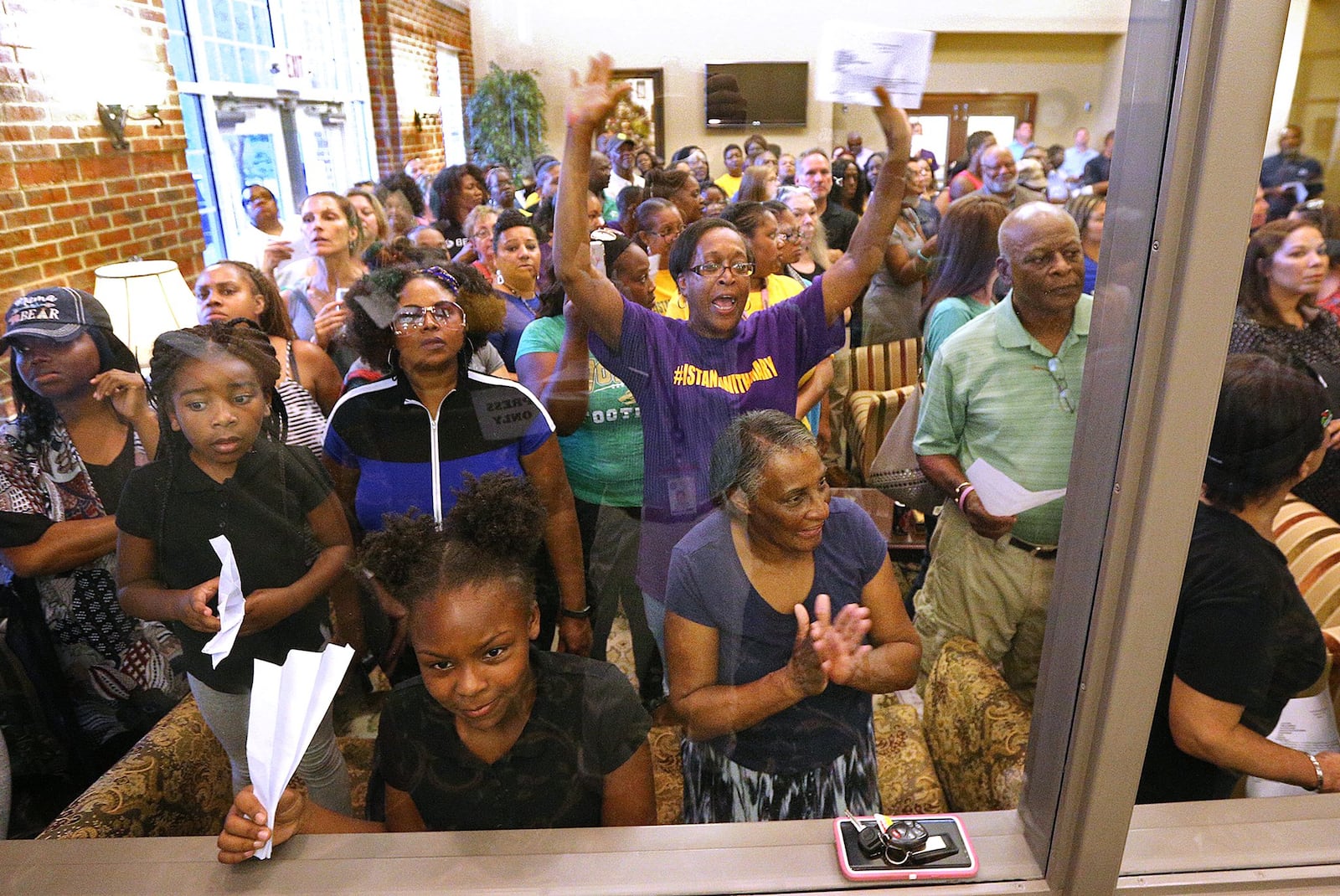 Buford drew the spotlight earlier this year when a man, believed to be the superintendent of schools, was heard on audio tape using racial slurs. The controversy attracted an overflow crowd to an August meeting of the Buford Board of Education. CURTIS COMPTON / CCOMPTON@AJC.COM