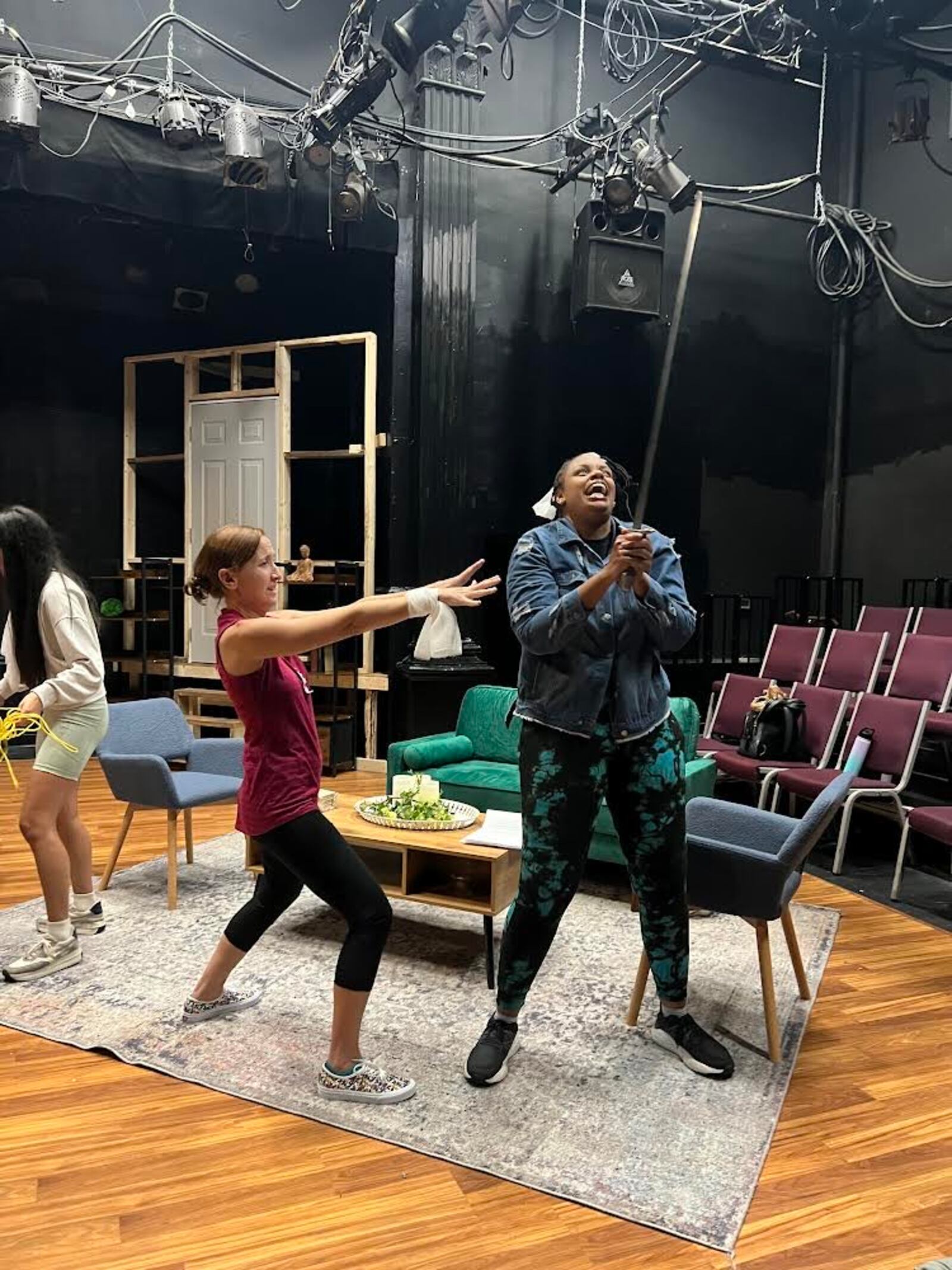 Jaclyn Faircloth (left) and Brittani Minnieweather rehearse swordplay. Photo: EmJ Fulford