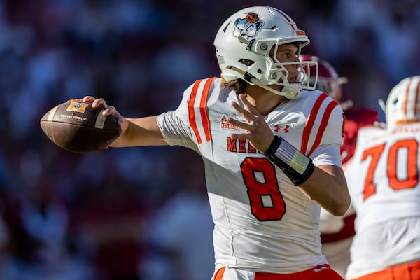 Mercer quarterback Whitt Newbauer (8) throws a pass during the first half of an NCAA college football game against Alabama, Saturday, Nov. 16, 2024, in Tuscaloosa, Ala. (AP Photo/Vasha Hunt)