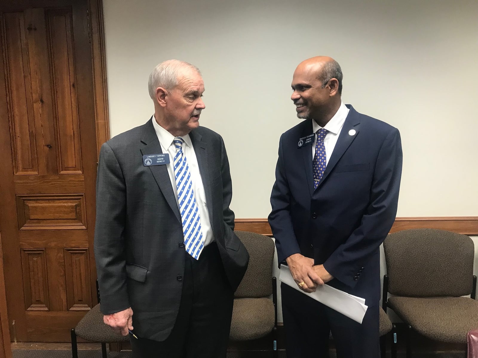 State Sen. Lindsey Tippins, R-Marietta, and Sen. Sheikh Rahman, D-Lawrenceville, discuss Rahman’s legislation that would allow some Georgia college students to get loans if they agree to pay them back with a portion of their future earnings. ERIC STIRGUS / ESTIRGUS@AJC.COM