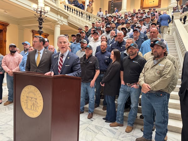 Georgia Senate President Pro Tempore John F. Kennedy, a Republican from Macon, recognizes Georgia line workers during a speech at the Capitol in Atlanta on Tuesday.