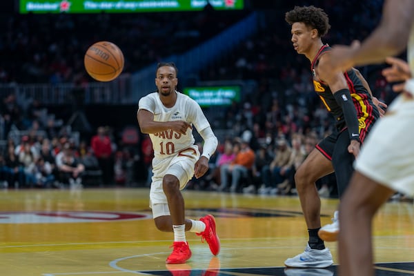 Cleveland Cavaliers guard Darius Garland (10) makes pass agaist Atlanta during the first half of an Emirates NBA Cup basketball game between the Cleveland Cavilers and the Atlanta Hawks on Friday, Nov. 29, 2024, in Atlanta. (AP Photo/Erik Rank)