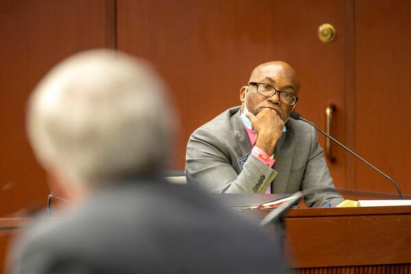 06/19/2020 - Atlanta, Georgia - Sen. Harold Jones II (D-Augusta) questions the proposed amendment provided by Sen. Bill Cowsert (R-Athens), foreground, on HB 426 during a Senate Judiciary committee meeting on day 34 of the legislative session at the Paul D. Coverdell building in Atlanta, Friday, June 19, 2020. Sen. Bill Cowsert (R-Athens) added an amendment to HB 426 that would add first responders to be a protected class in Georgia's proposed hate crime law. The amendment passed the committee with no support from Democrats and will now be presented to the House.(ALYSSA POINTER / ALYSSA.POINTER@AJC.COM)