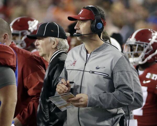  FILE - In this Jan. 9, 2017 file photo, Alabama offensive coordinator Steve Sarkisian stands on the sidelines during the second half of the NCAA college football playoff championship game against Clemson in Tampa, Fla. The Atlanta Falcons have hired Sarkisian as their new offensive coordinator. The move was announced Tuesday, Feb. 7 less than 24 hours after Kyle Shanahan left to become head coach of SF 49ers. (AP Photo/David J. Phillip, File)