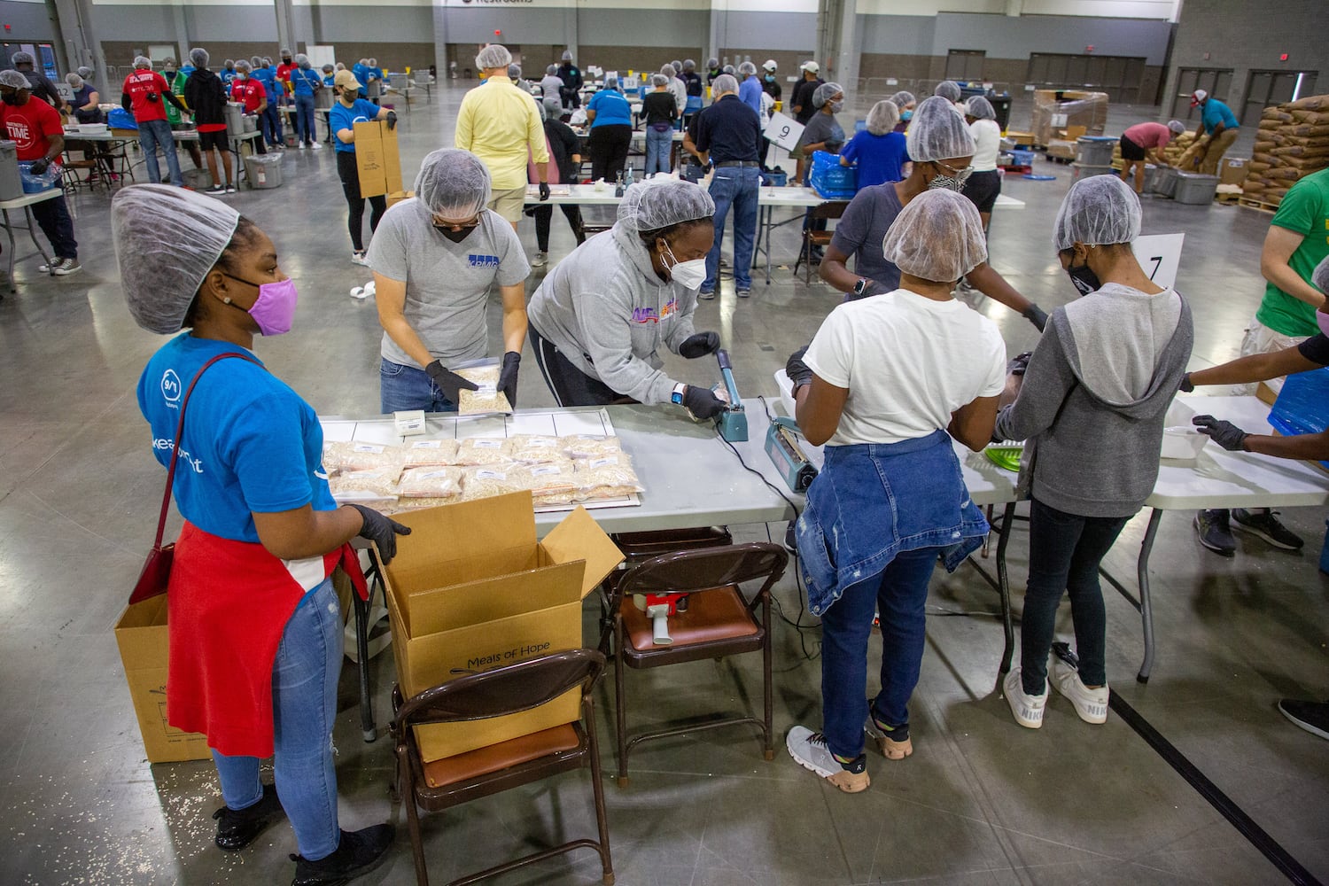 Hundreds of volunteers will pack 200,000 meals for the Atlanta Community Food Bank