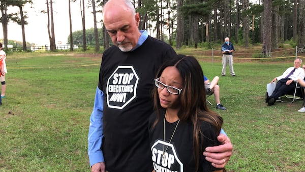 Tykecia Wilson, executed inmate Marion Wilson's daughter, stands with Stanley Saunders, who has been visiting her father and other death row inmates for nearly 20 years.