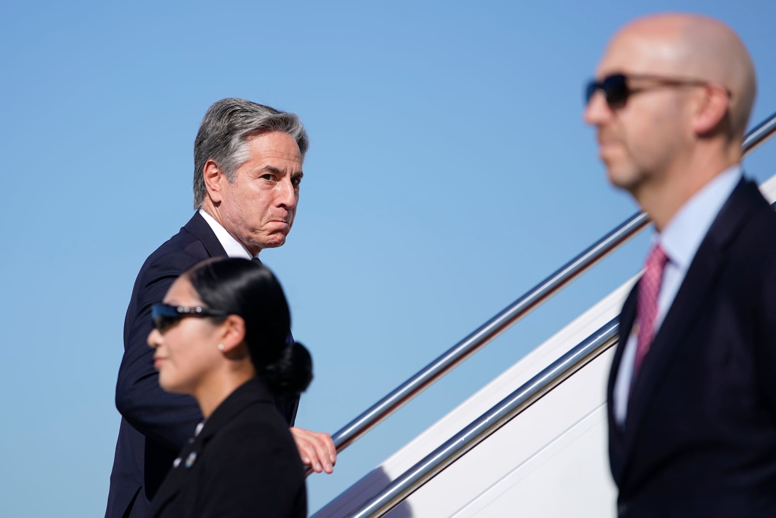 Secretary of State Antony Blinken walks to board a plane en route to the Middle East as he departs Joint Base Andrews, Md., Monday, Oct. 21, 2024. (Nathan Howard/Pool Photo via AP)