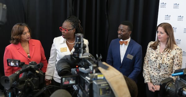 DeKalb County Interim Superintendent Dr. Vasanne Tinsley (left), School Board Chair Vickie B. Turner and board members Diijon DaCosta and Anna Hill speak at a news conference on April 27, 2022. A day earlier the school board terminated Cheryl Watson-Harris, who had been the district's superintendent for nearly two years. (Natrice Miller / natrice.miller@ajc.com)