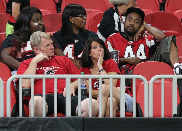 September 23, 2018 Atlanta: Atlanta Falcons fans sit dejected in the stands after falling 43-37 to the New Orleans Saints during overtime in an NFL football game on Sunday, Sept 23, 2018, in Atlanta. CURTIS COMPTON/CCOMPTON@AJC.COM