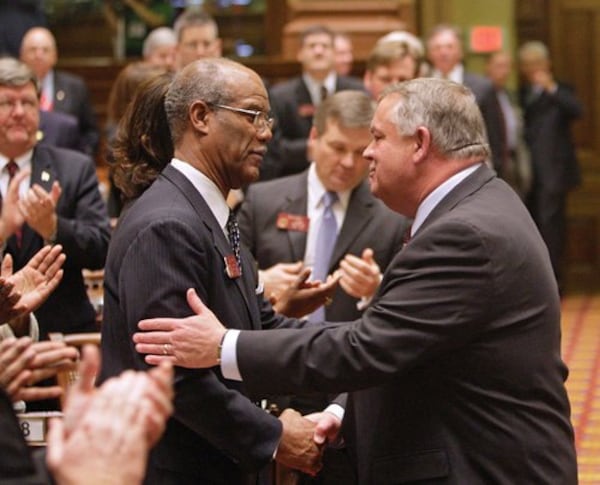 Republican Georgia House Speaker David Ralston, right, and Democratic state Rep. Calvin Smyre shake hands. “With Speaker Ralston, there was a level of trust between us. We had a great friendship. We worked hand-in-hand on elevating transportation and mental health," Smyre said.