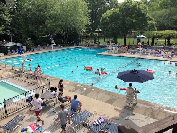 Dip in the pool, sit on sunchairs or read a book in chairs with shaded umbrellas Garden Hills Pool in Atlanta. 
(Courtesy of Jack Moriarity)